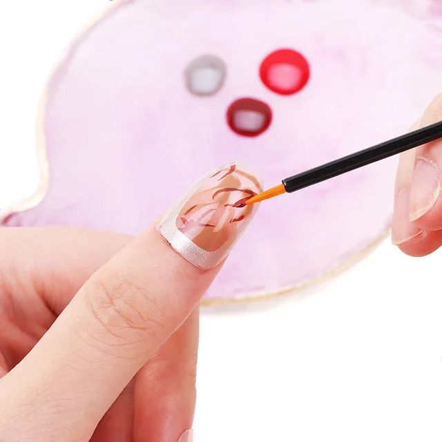 how do you clean nail art brushes